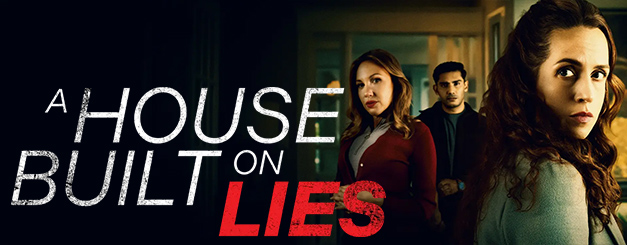 Title card for LMN's 2026 film "A House Built on Lies" with large, bold white and red lettering. A dramatic low-light scene featuring Kimberly-Sue Murray as Daisy, Diana Salvatore as Louise and Ansh Pandey as Zack in an indoor setting. In the foreground, Daisy, a woman with long, dark wavy hair looks over her shoulder with a tense expression. In the background, Zack and Louise stand watching, all illuminated by moody, warm lighting.